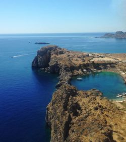 Scenic view of sea against clear blue sky