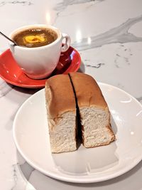 Close-up of coffee served on table