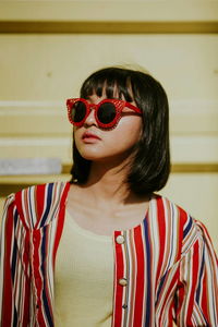 Portrait of woman wearing sunglasses