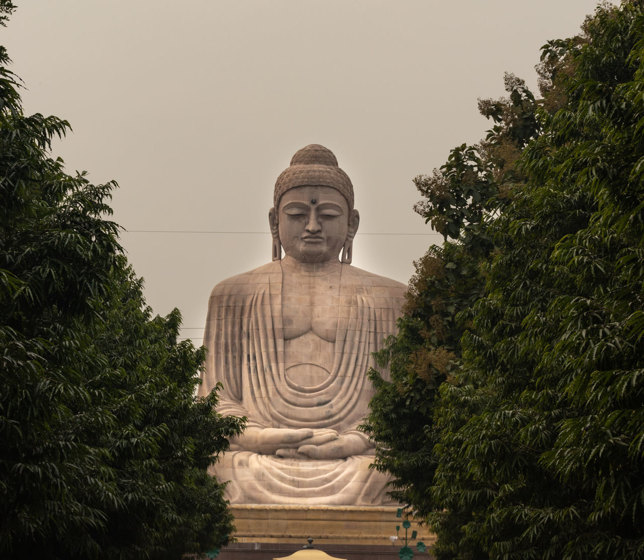 STATUE OF TEMPLE AGAINST SKY