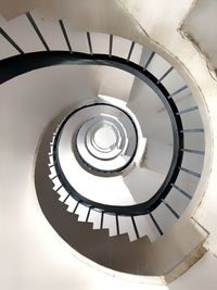 Directly below shot of spiral staircase in building