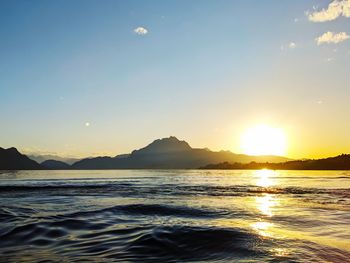 Scenic view of sea against sky during sunset