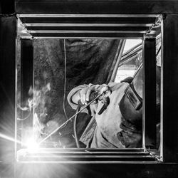 Low angle view of person in factory