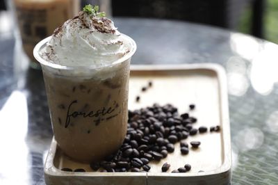 Close-up of coffee served on table