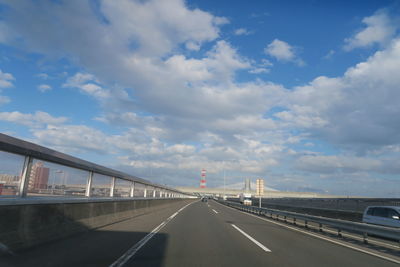 Bridge over road against sky