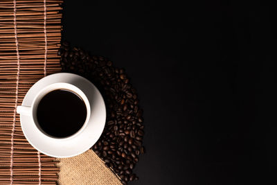 Directly above shot of coffee served on table