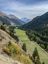 High angle view of trees and mountains against sky