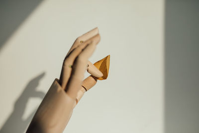 Midsection of woman holding umbrella