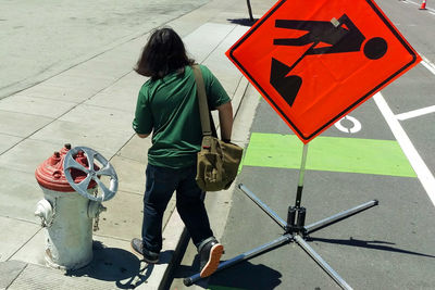 Man standing on road