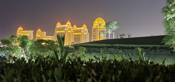 Panoramic view of temple amidst buildings against sky
