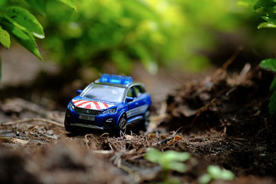 Close-up of toy car on field