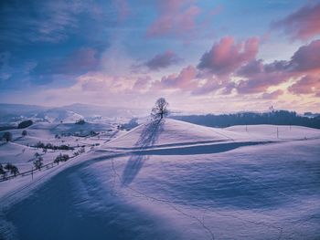 High angle view of snow covered landscape against sky