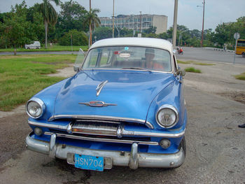 Vintage car on road in city