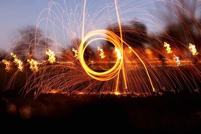 Illuminated wire wool during sunset