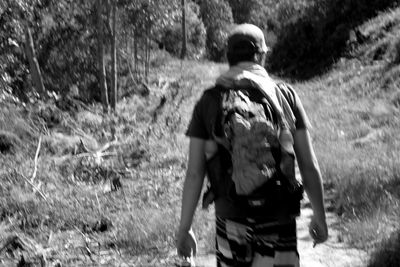 Woman standing on grassy field