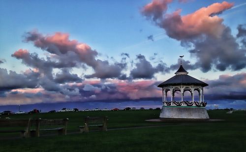 Scenic view of landscape against cloudy sky