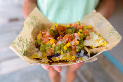 Close-up of hand holding food