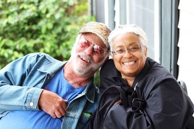 Portrait of cheerful mature couple outdoors
