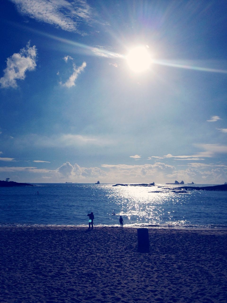 sea, water, sun, horizon over water, sunlight, sky, beach, sunbeam, scenics, tranquil scene, tranquility, beauty in nature, blue, nature, sunny, reflection, lens flare, shore, idyllic, sand