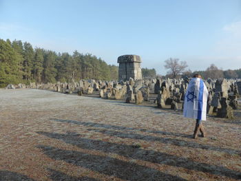 Rear view of women walking in park