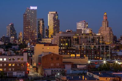 View of city lit up at night