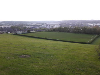 Scenic view of field against clear sky