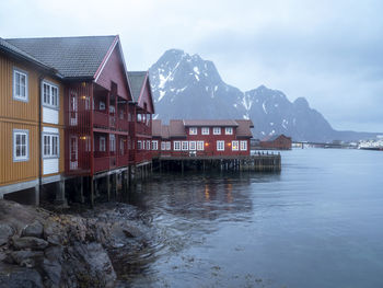 Traditional waterfront buildings on the rocky coast at svolvaer, lofoten islands, norway