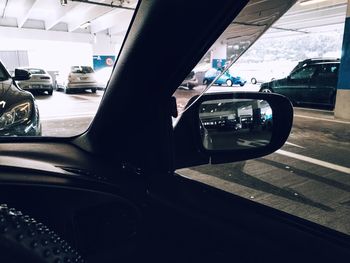 Close-up of car on side-view mirror