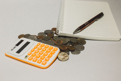 High angle view of coins on table