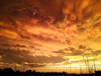 Low angle view of cloudy sky at sunset