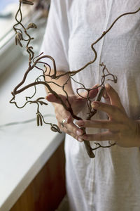 Close-up of woman holding hands