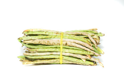 Close-up of bread against white background