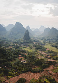 Mountains under cloudy sky at sunset, guilin, china