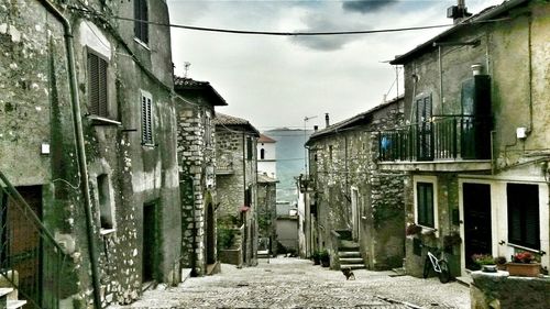 Narrow alley with buildings in background