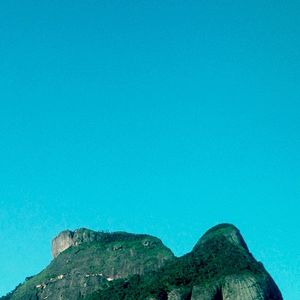 Scenic view of rock formation against blue sky