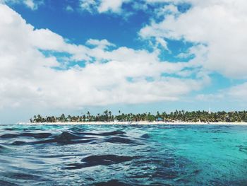 Scenic view of sea against cloudy sky