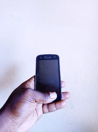 Close-up of person using mobile phone