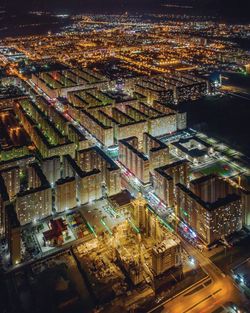 High angle view of illuminated buildings in city