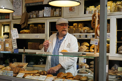 Portrait of a man working in store