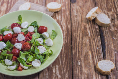 High angle view of salad in bowl on table