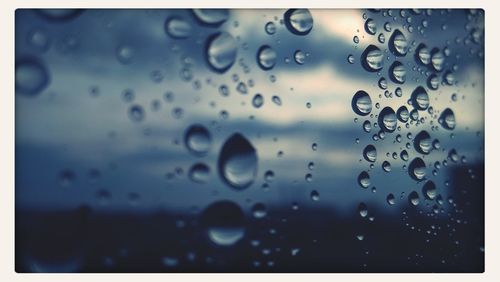 Close-up of water drops on glass