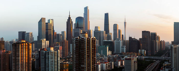 Skyscrapers in city against clear sky