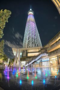 Low angle view of illuminated building at night