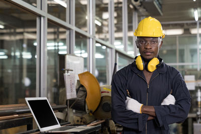 Portrait of man working in office