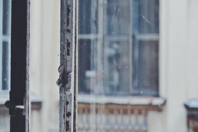 Close-up of sea seen through window