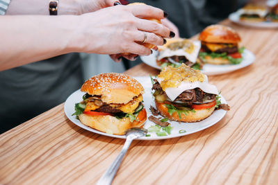 Burgers with beef and vegetables. close up. delicious burgers in a cooking class. 