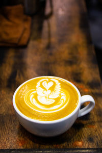 Close-up of cappuccino on table