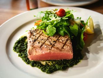 Tuna steak served in plate