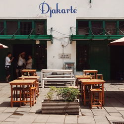 Group of people at restaurant in city