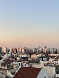 High angle view of townscape against sky at sunset